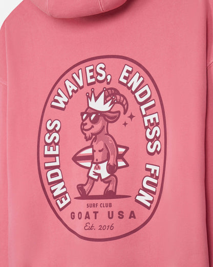 Salmon-colored hoodie with a graphic design of a goat and text on a pink background