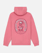 Salmon-colored hoodie with a graphic design on the back against a white background
