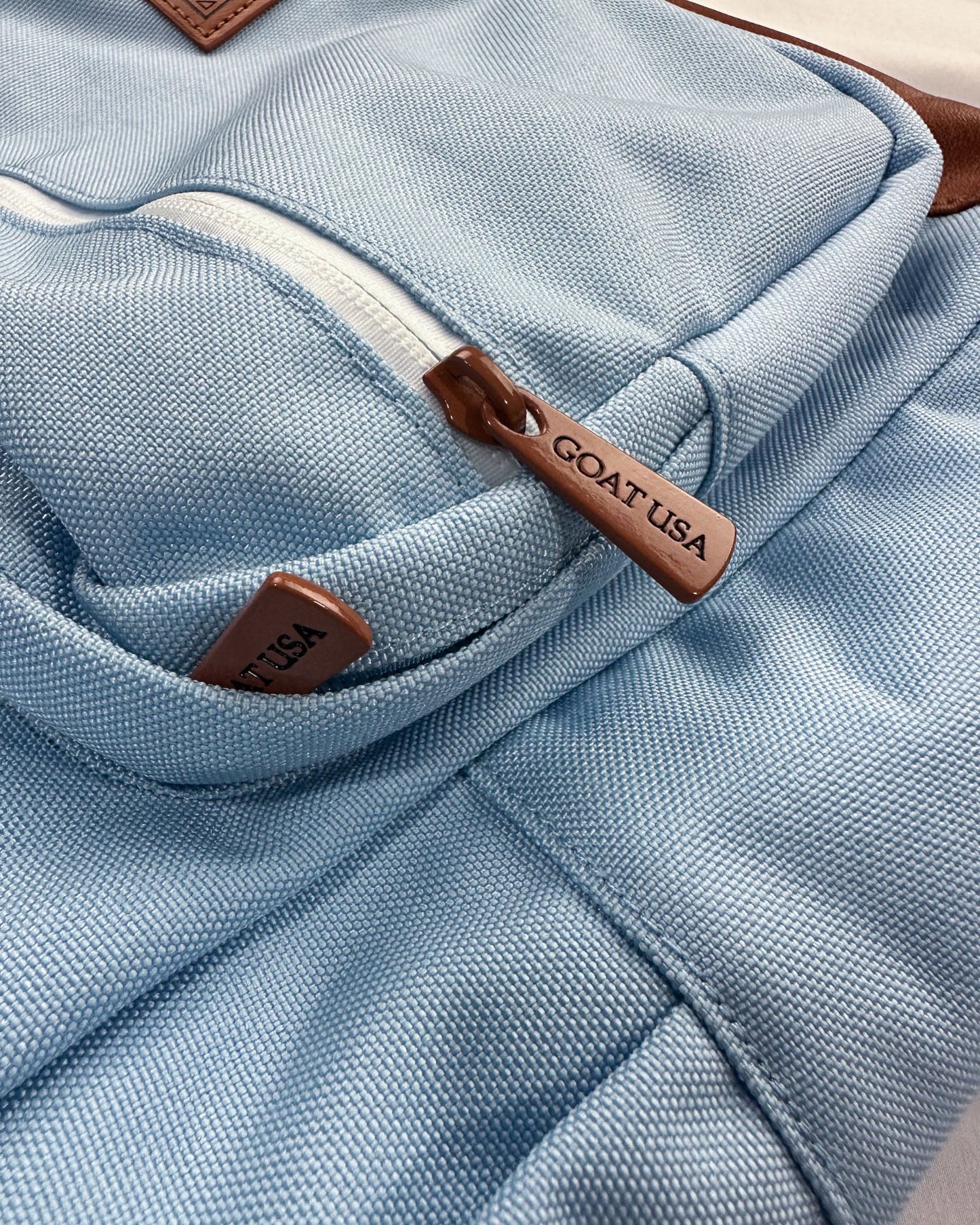Close up of carolina blue OG Backpack#color_carolina-blue