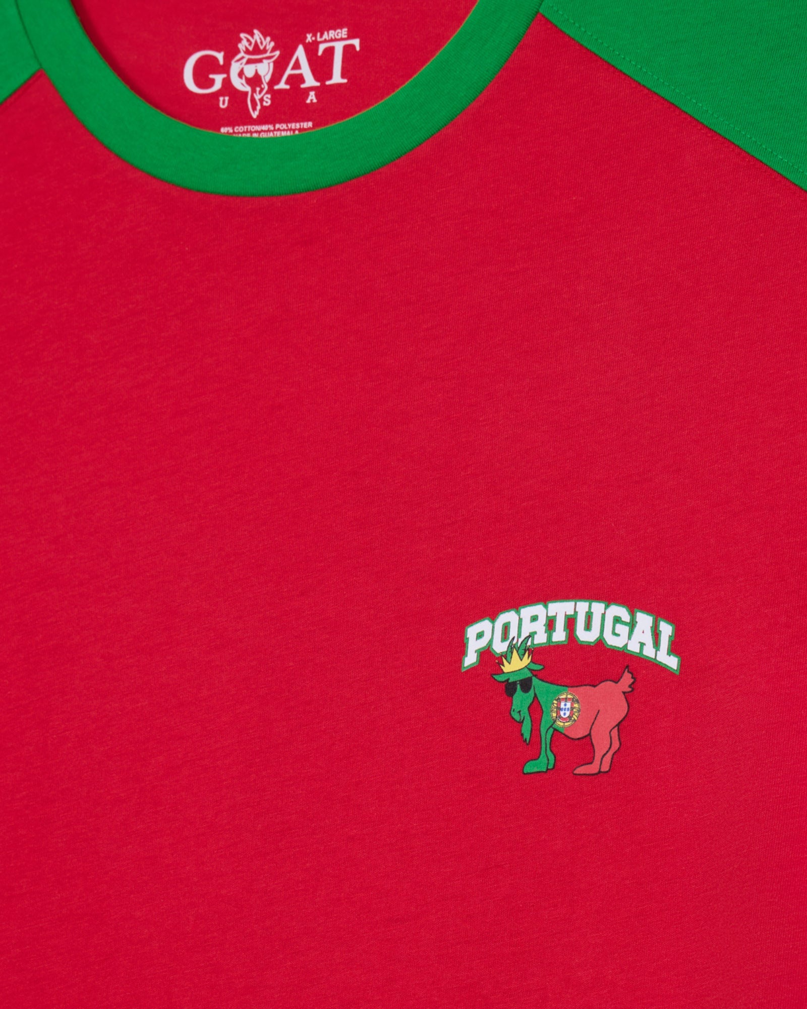 Red shirt with 'Portugal' logo and green collar, featuring a brand logo at the top.