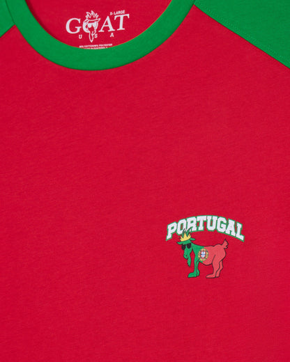 Red shirt with 'Portugal' logo and green collar, featuring a brand logo at the top.
