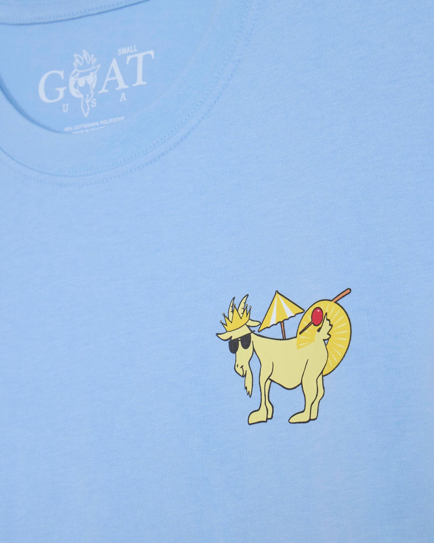 Light blue t-shirt with a yellow goat graphic and 'GOAT' logo on a light blue background