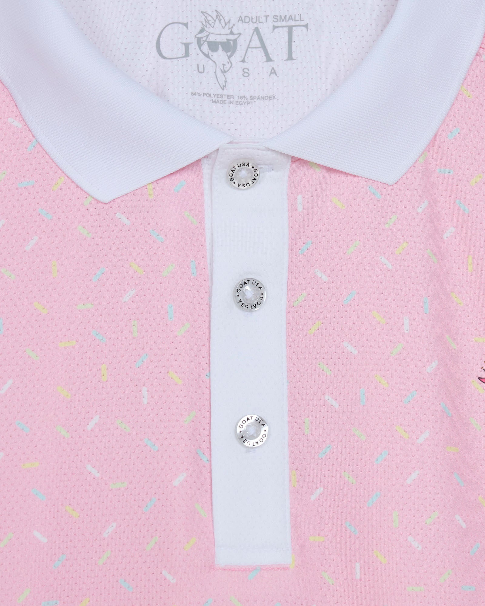 Pink polo shirt with white collar and decorative buttons, featuring the brand 'GOAT USA'.