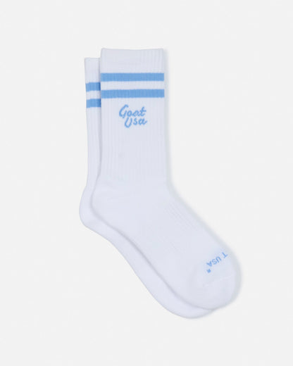 Laid out pair of socks with light blue stripes#stripe-color_carolina-blue