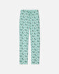 Light green pajama pants with goat pattern on a white background