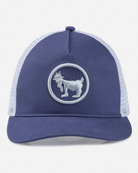 Blue trucker cap with white mesh back and logo on a light gray background