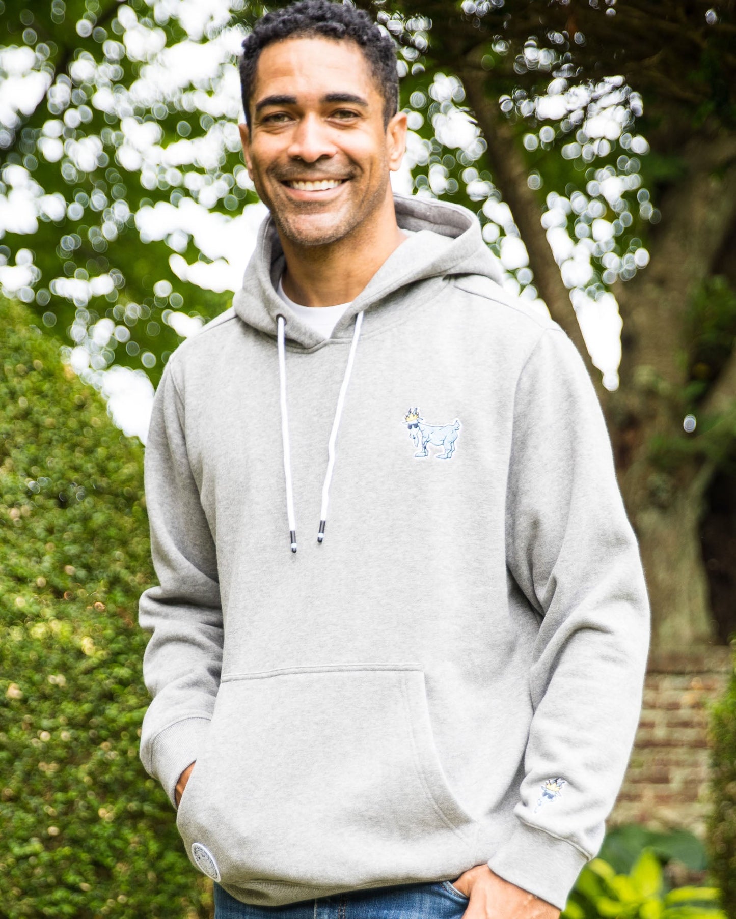 Model wearing gray OG Hooded Sweatshirt#color_gray