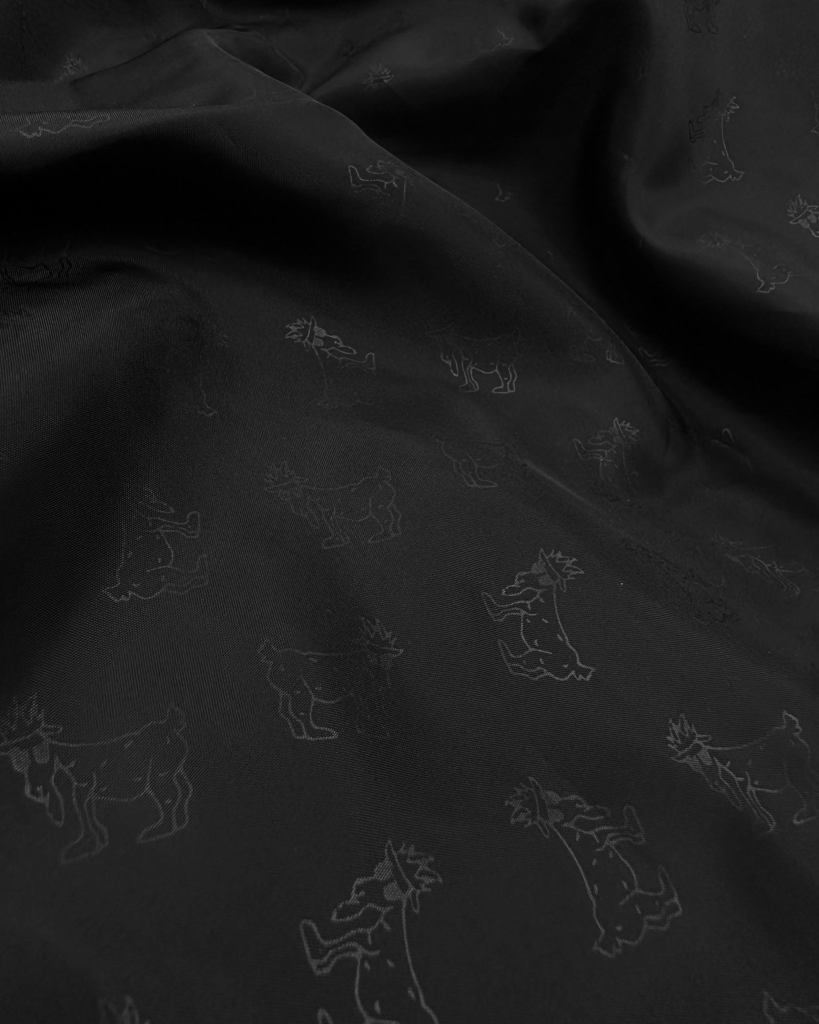Close up of lining on black Men's Puffer Jacket#color_black