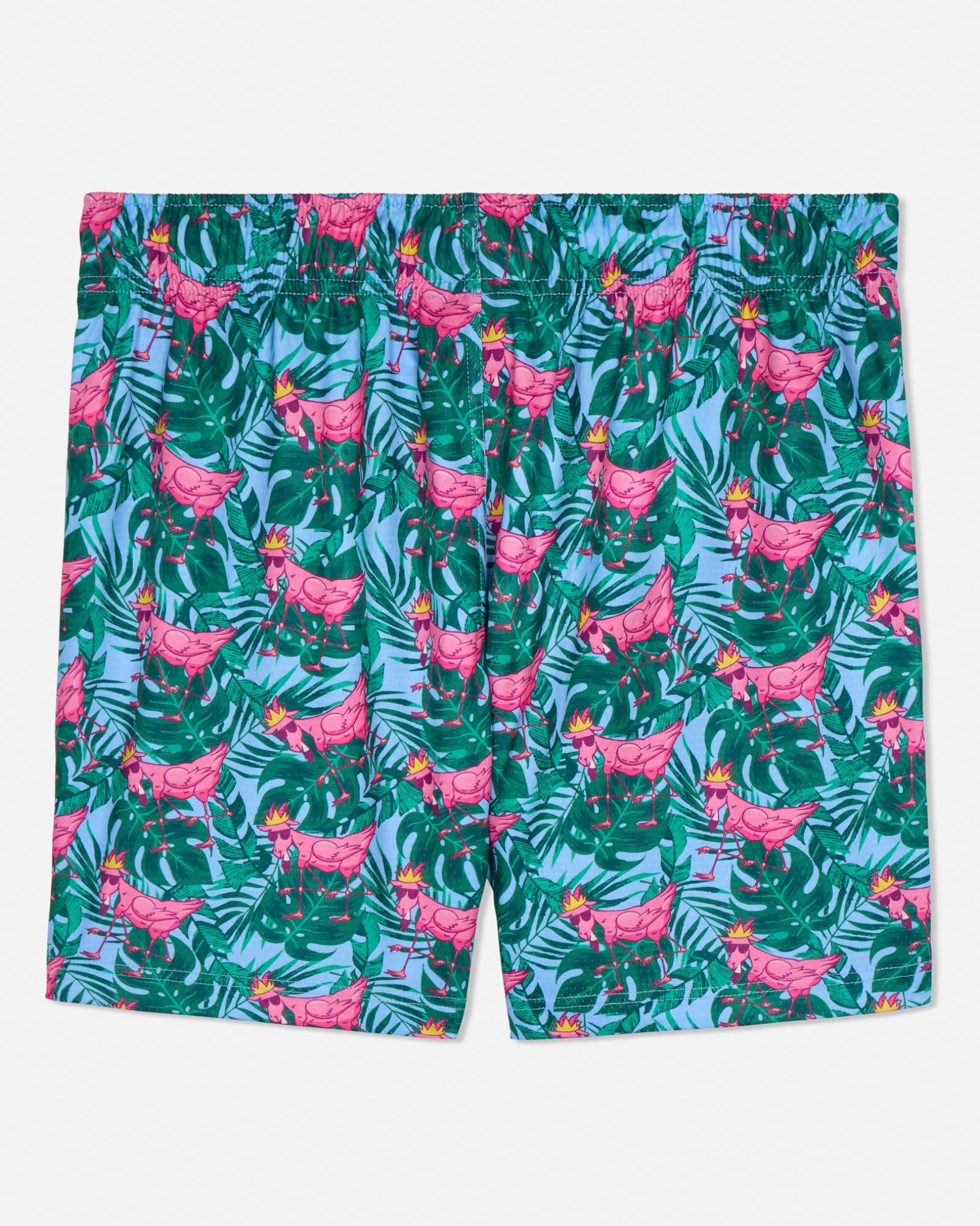 Tropical patterned shorts with pink flamingo goats on a white background
