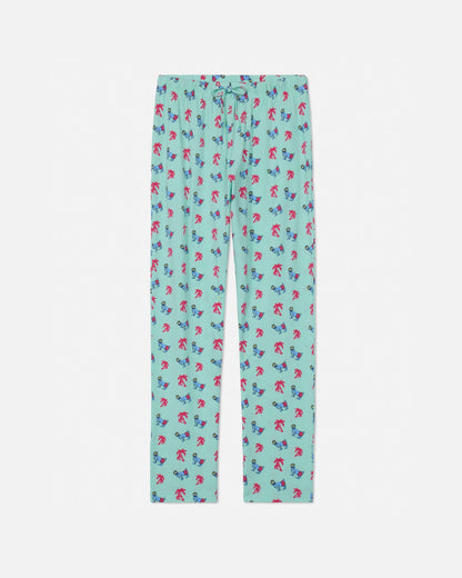 Palm tree-patterned pajama pants on a white background