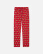 Red pajama pants with burger & fries pattern on a white background