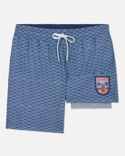 Blue patterned shorts with a logo on a white background