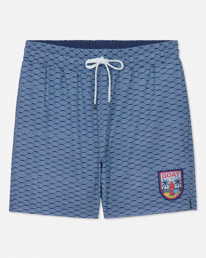 Blue patterned shorts with a logo on a white background