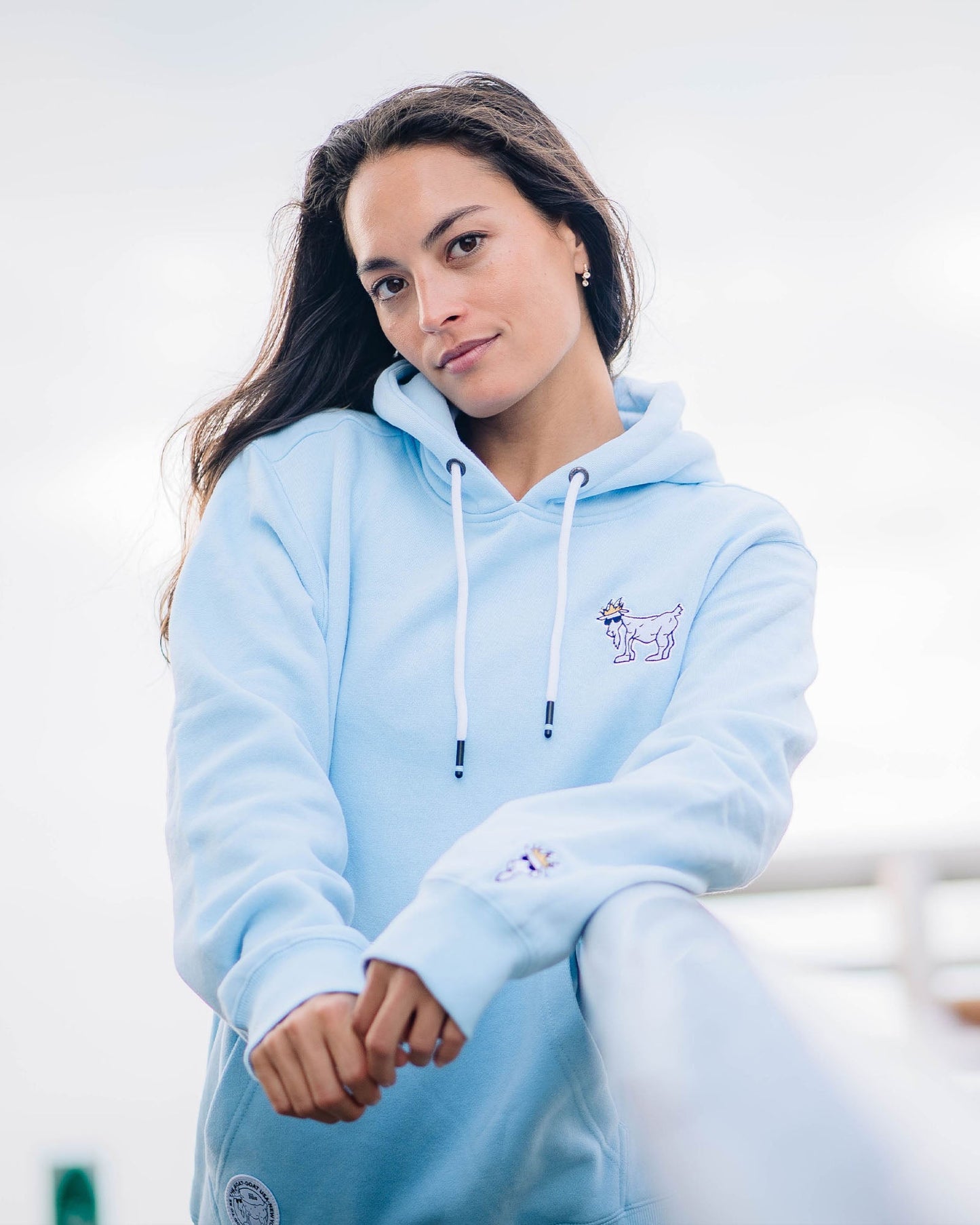 Model wearing carolina blue WG Hooded Sweatshirt#color_carolina-blue