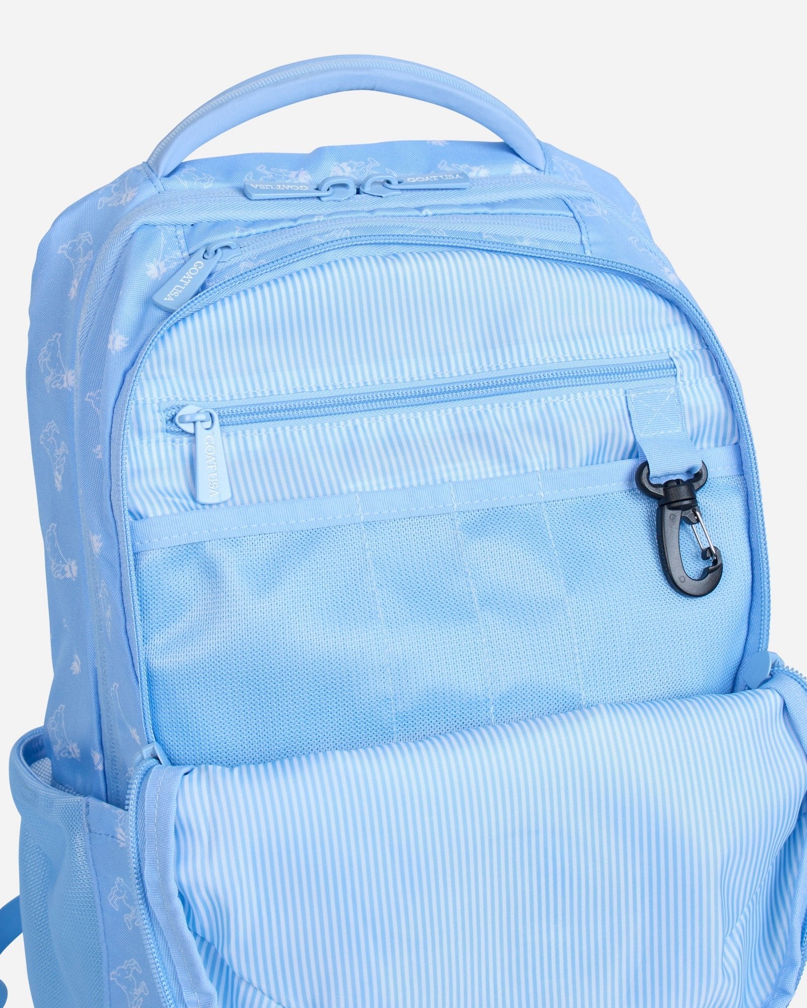 Carolina blue backpack showcasing the secondary compartment#color_carolina-blue