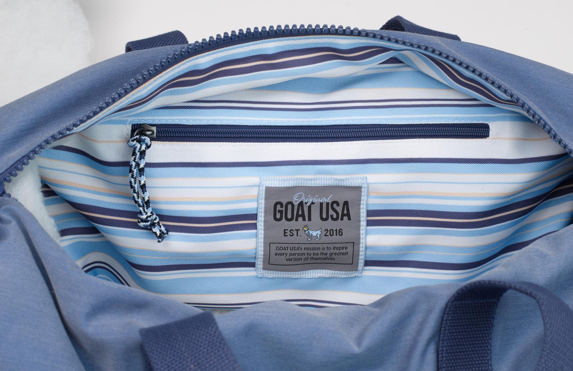 Inside of navy duffle bag#color_navy
