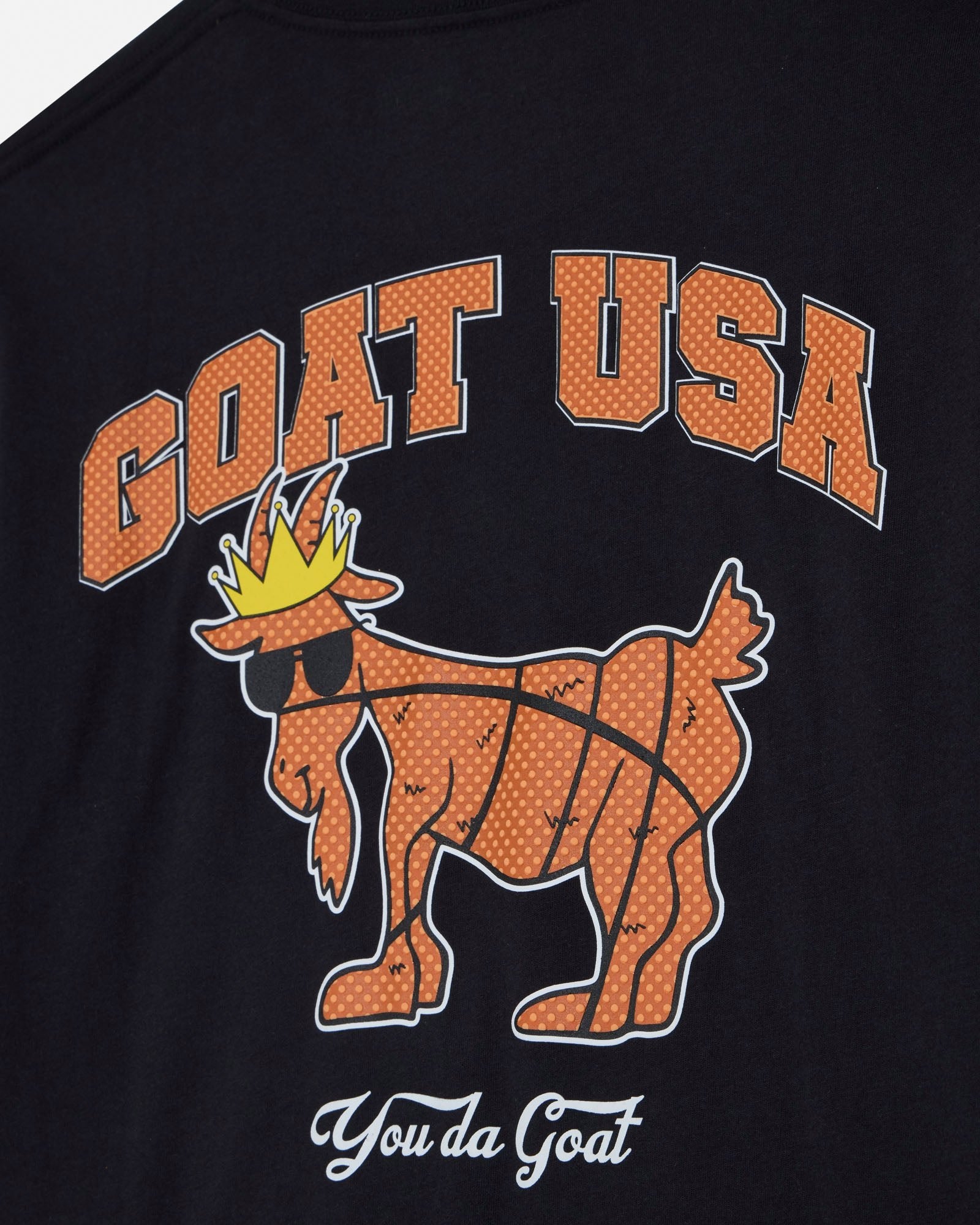 Black t-shirt with 'GOAT USA' and goat graphic design on a black background