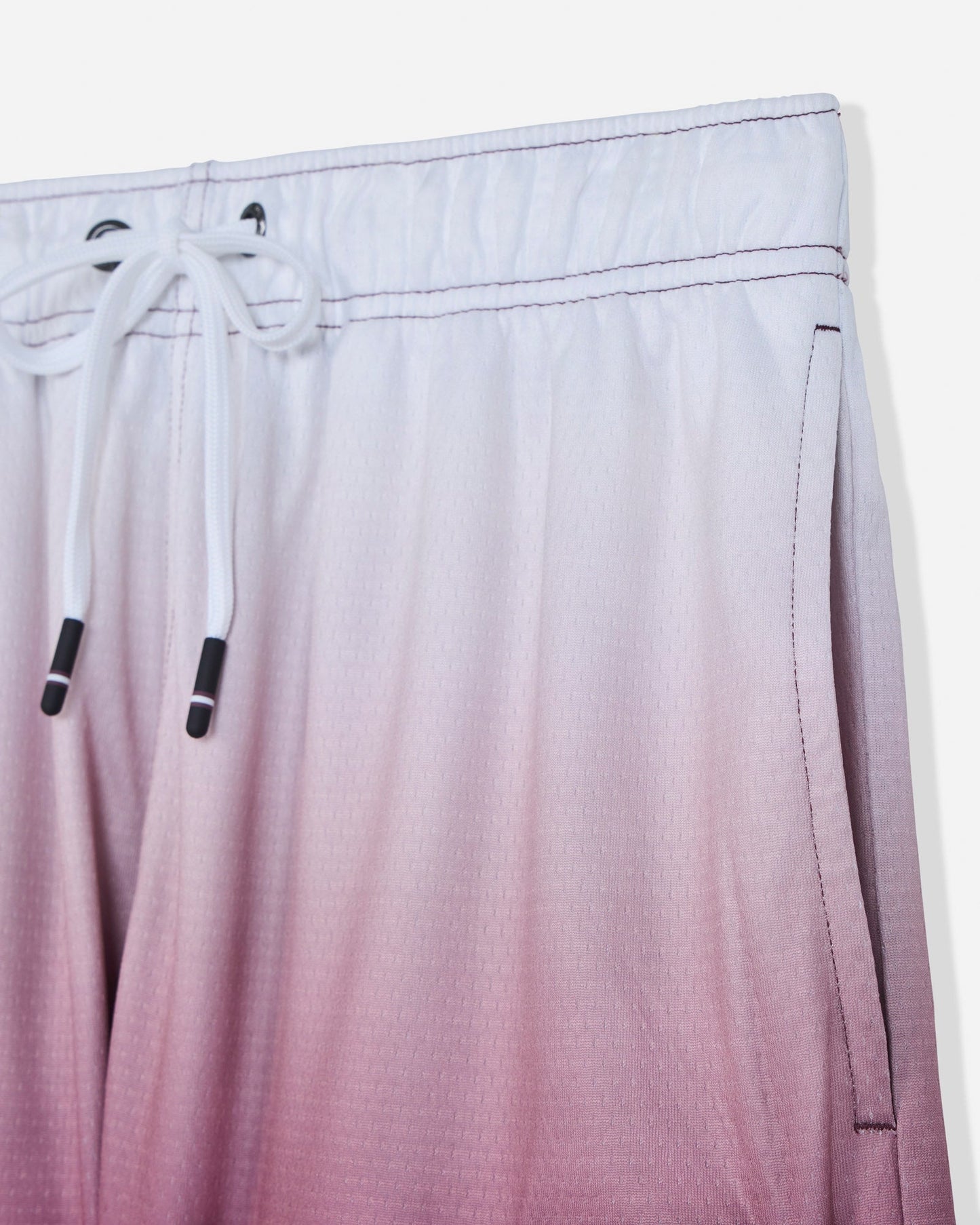 Close-up of pocket on maroon fade mesh shorts#color_windsor-wine