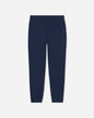 A pair of navy blue sweatpants with an elastic waistband and a small white embroidered logo on the left hip, shown against a light gray background.#color_navy-blazer