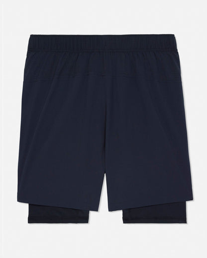Pair of black shorts on a light gray background