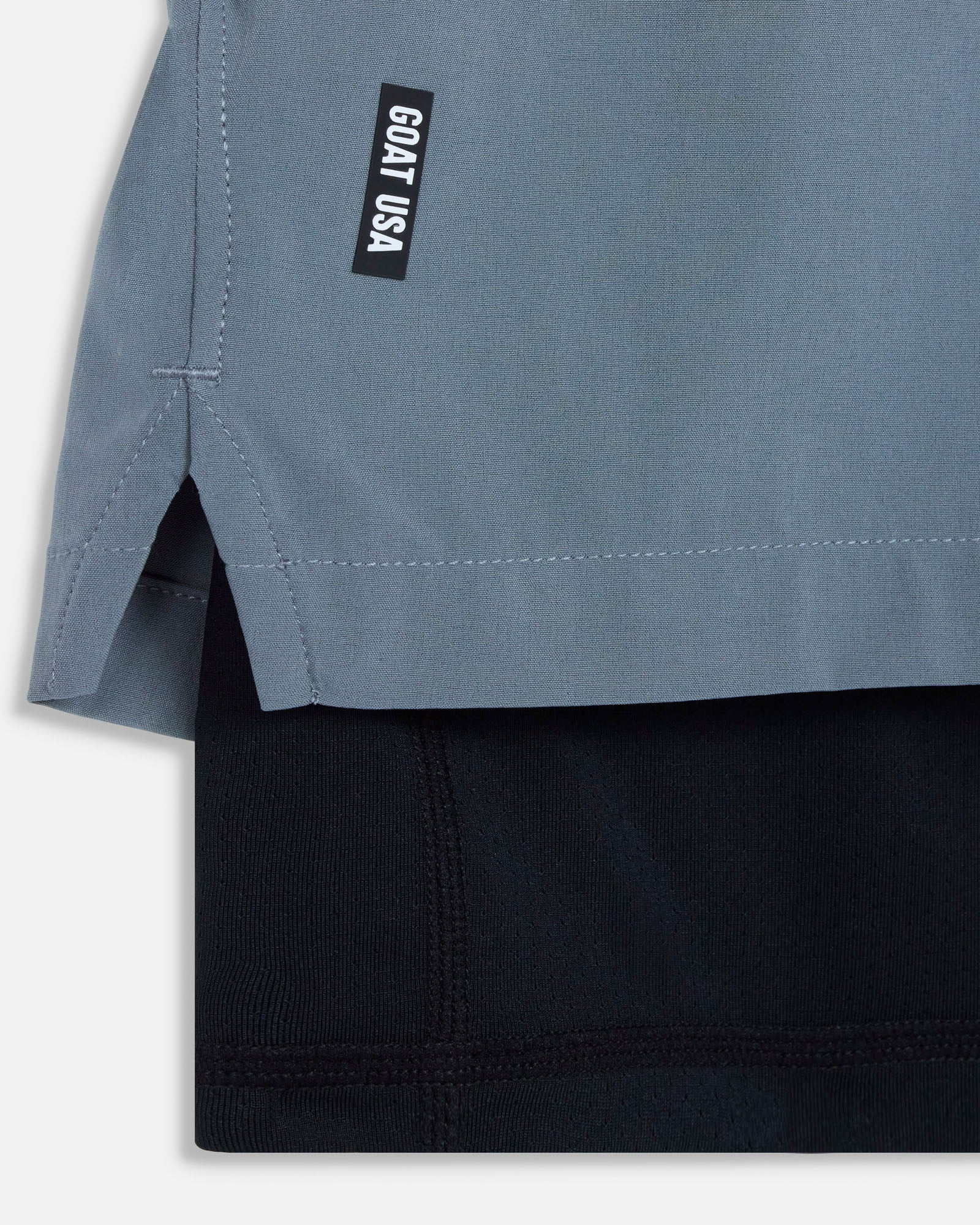 Close-up of a gray shirt with a black logo on a white background#color_storm-gray