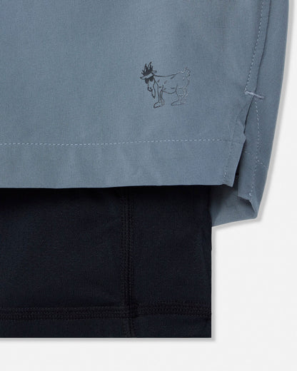 Close-up of a gray garment with a logo on a white background#color_storm-gray