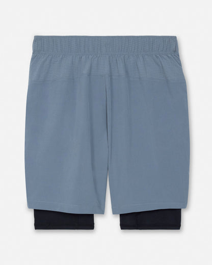 Gray athletic shorts with a white background#color_storm-gray