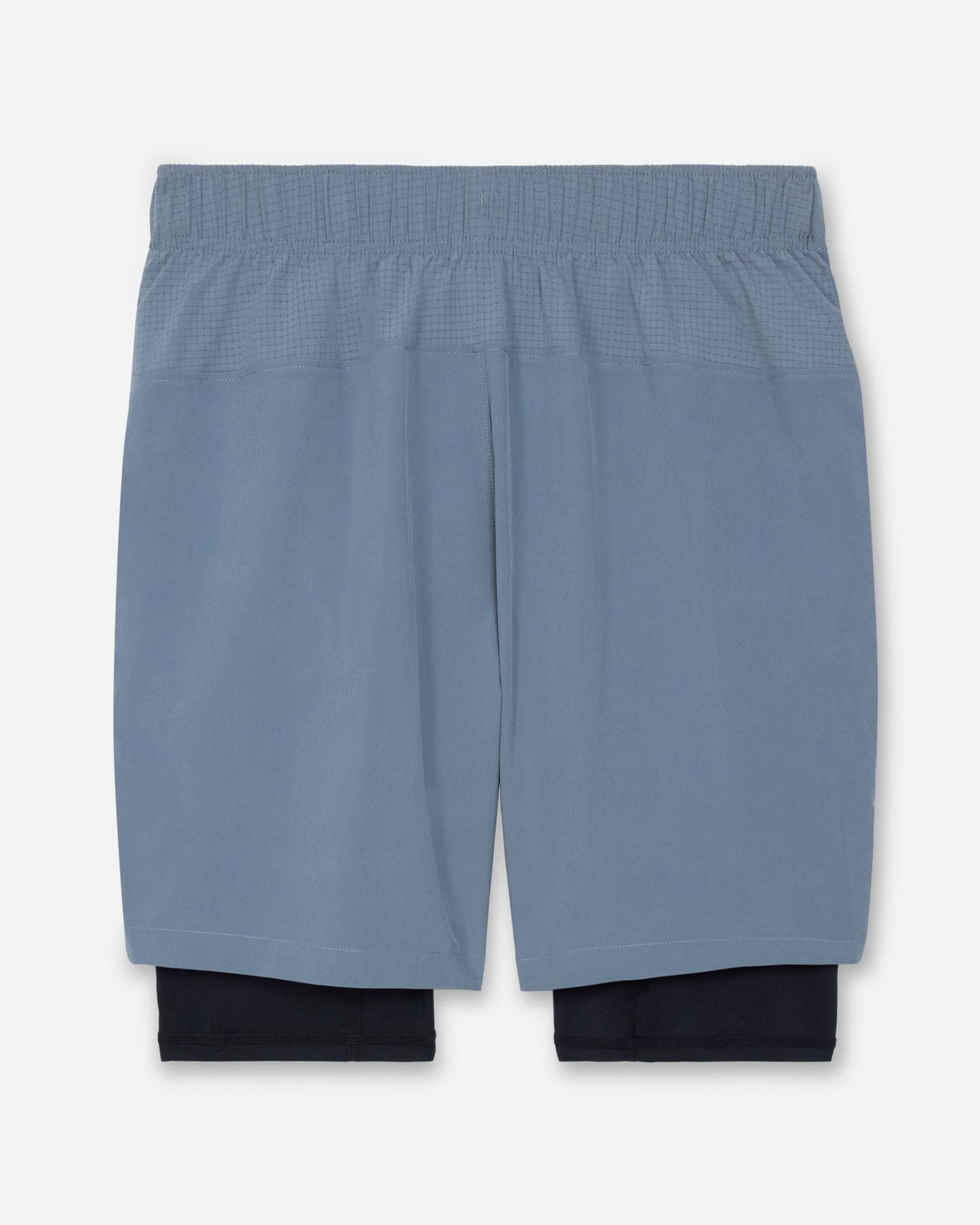 Gray athletic shorts with a white background#color_storm-gray