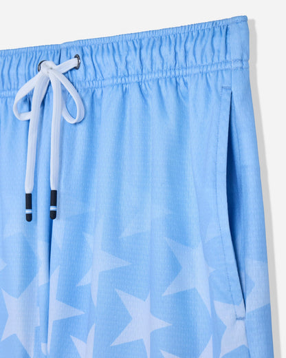 Close-up of pocket of carolina blue mesh shorts with a star pattern#color_carolina-blue