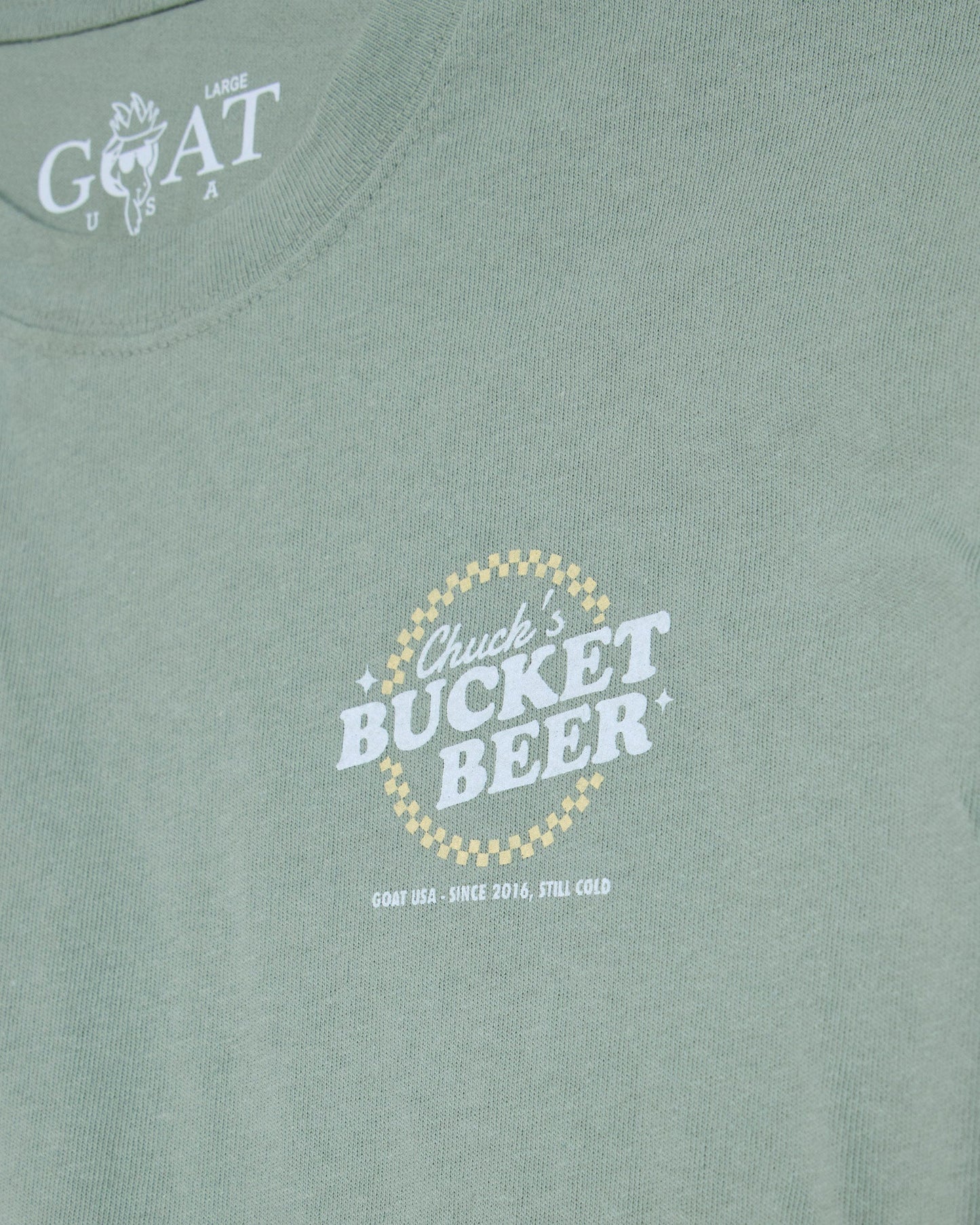'Chuck's Bucket Beer' left-chest graphic on steeped sage t-shirt