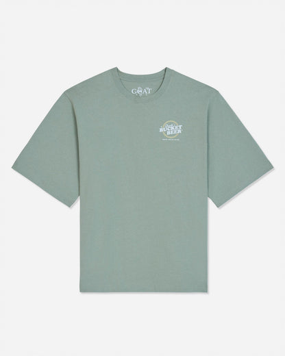 Front of steeped sage t-shirt with 'Chuck's Bucket Beer' left-chest graphic