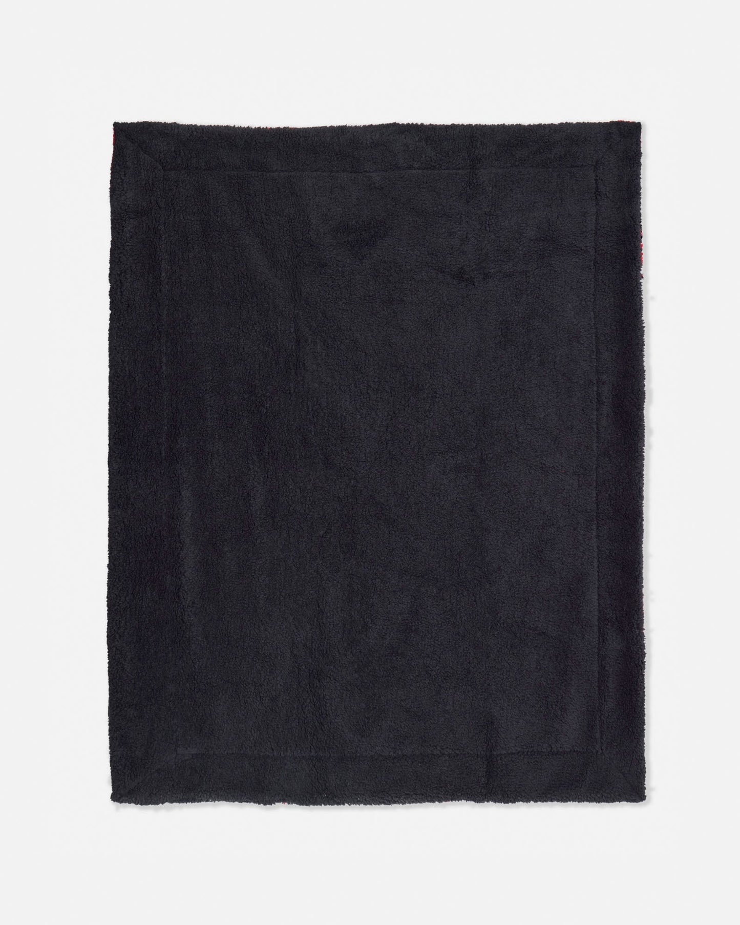 Black blanket on a white background