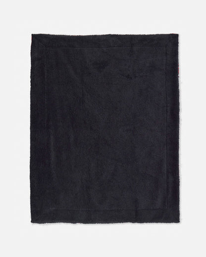 Black blanket on a white background
