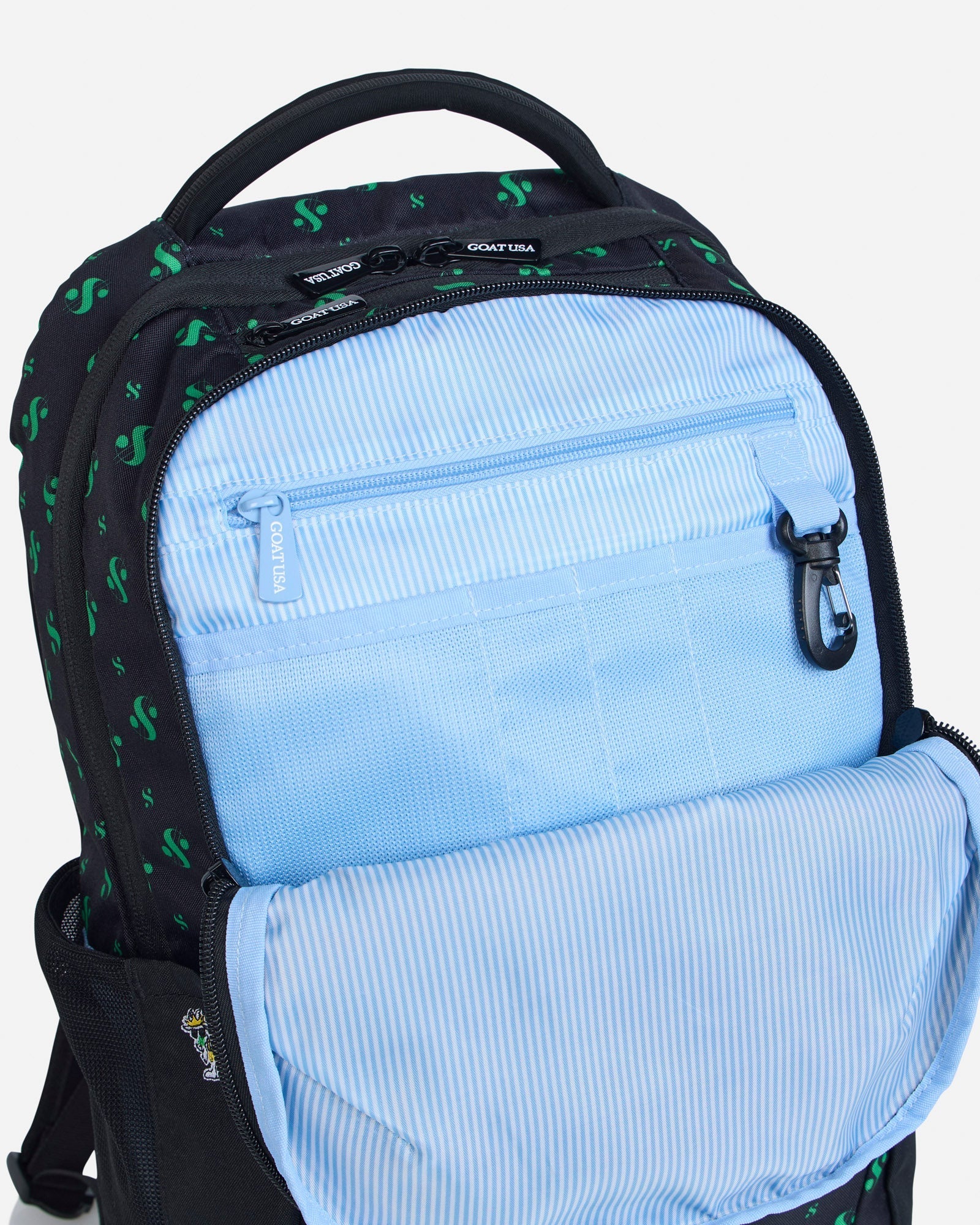 Secondary compartment of black backpack with dollar sign design