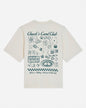 Back of bone t-shirt with casino games design and text that reads "Chuck's Card Club All In or Nothing - Welcome to the Club"