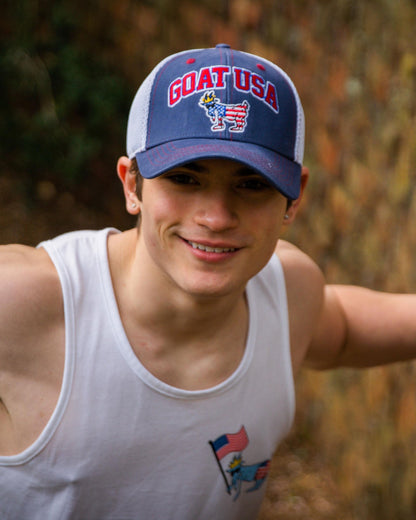 Model wearing navy Freedom Trucker Hat#color_navy