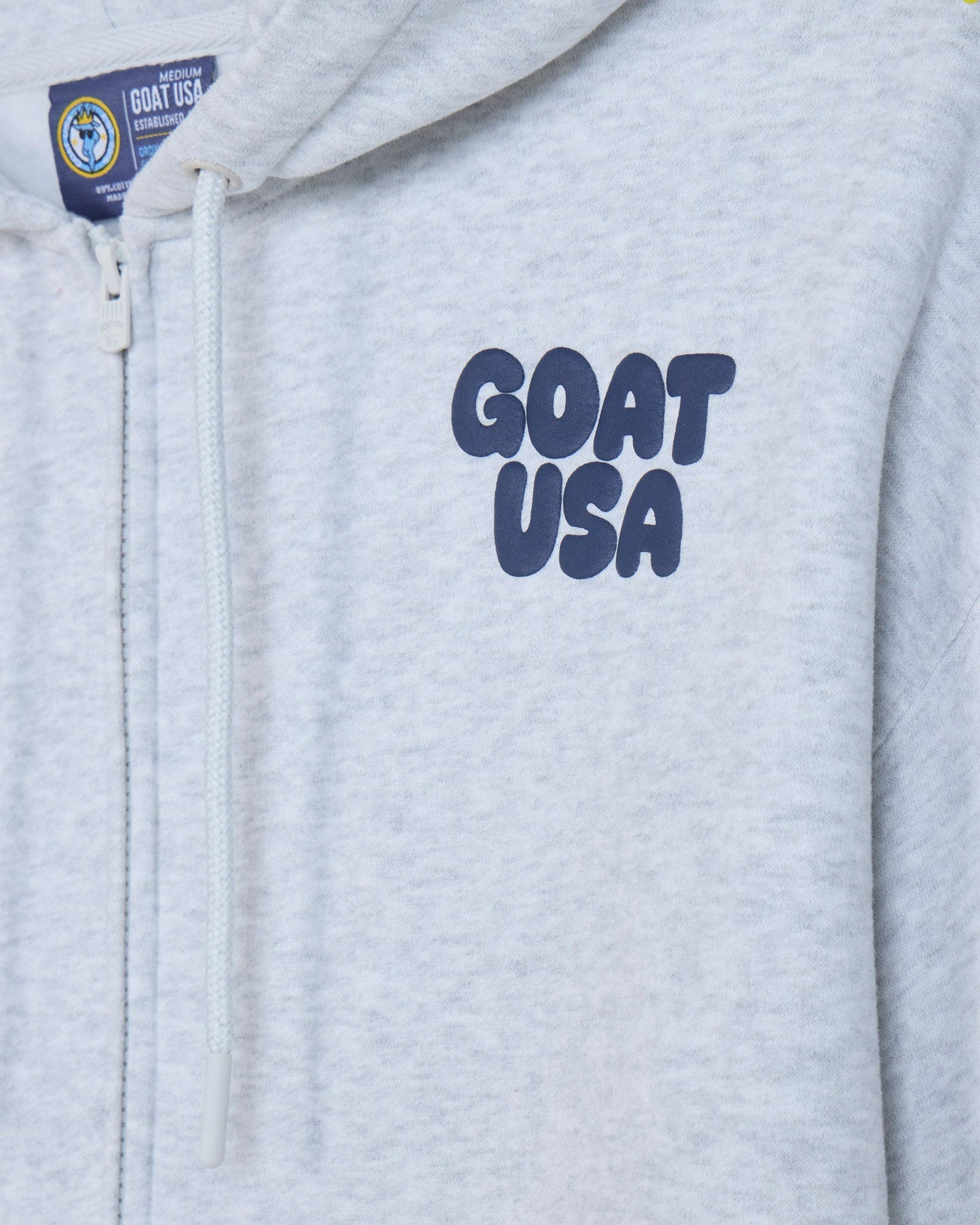 Close-up of front of gray hoodie with 'GOAT USA' left-chest logo text#color_pale-gray-heather