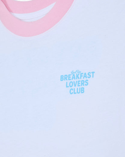 Left chest graphic that reads 'GOAT USA BREAKFAST LOVERS CLUB' on a white oversized t-shirt