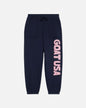 Navy blue sweatpants with 'GOAT USA' text in pink on a light gray background#color_navy