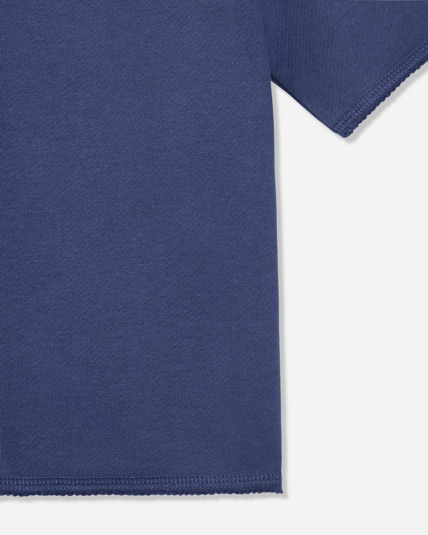 Close-up of hem on navy french terry tee#color_navy