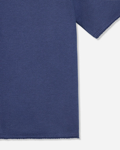Close-up of hem on navy french terry tee#color_navy