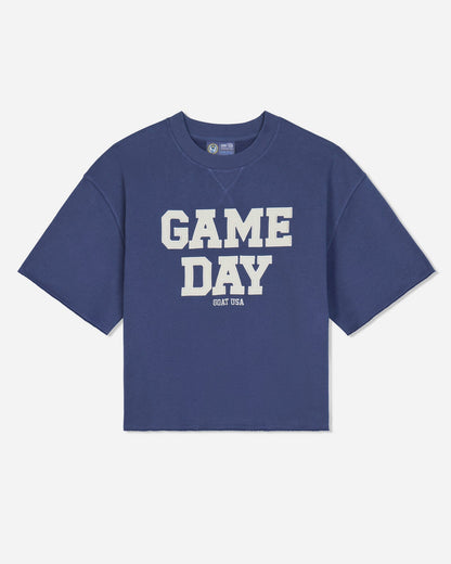 A blue short-sleeve french terry t-shirt with 'GAME DAY' printed in bold white block letters on the front, with 'GOAT USA' printed underneath, shown against a light gray background.#color_navy