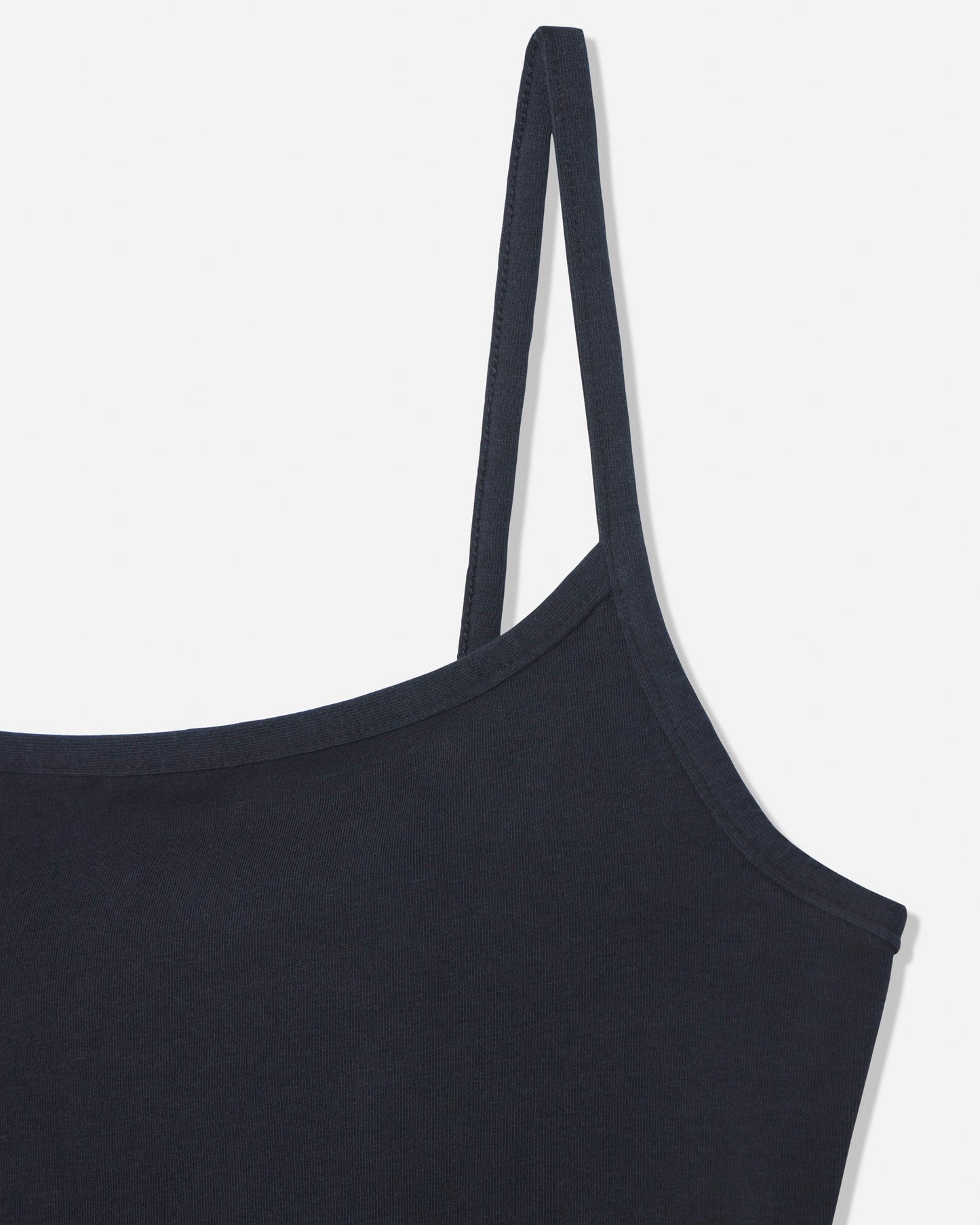 Close-up of front of black cami tank top#color_black