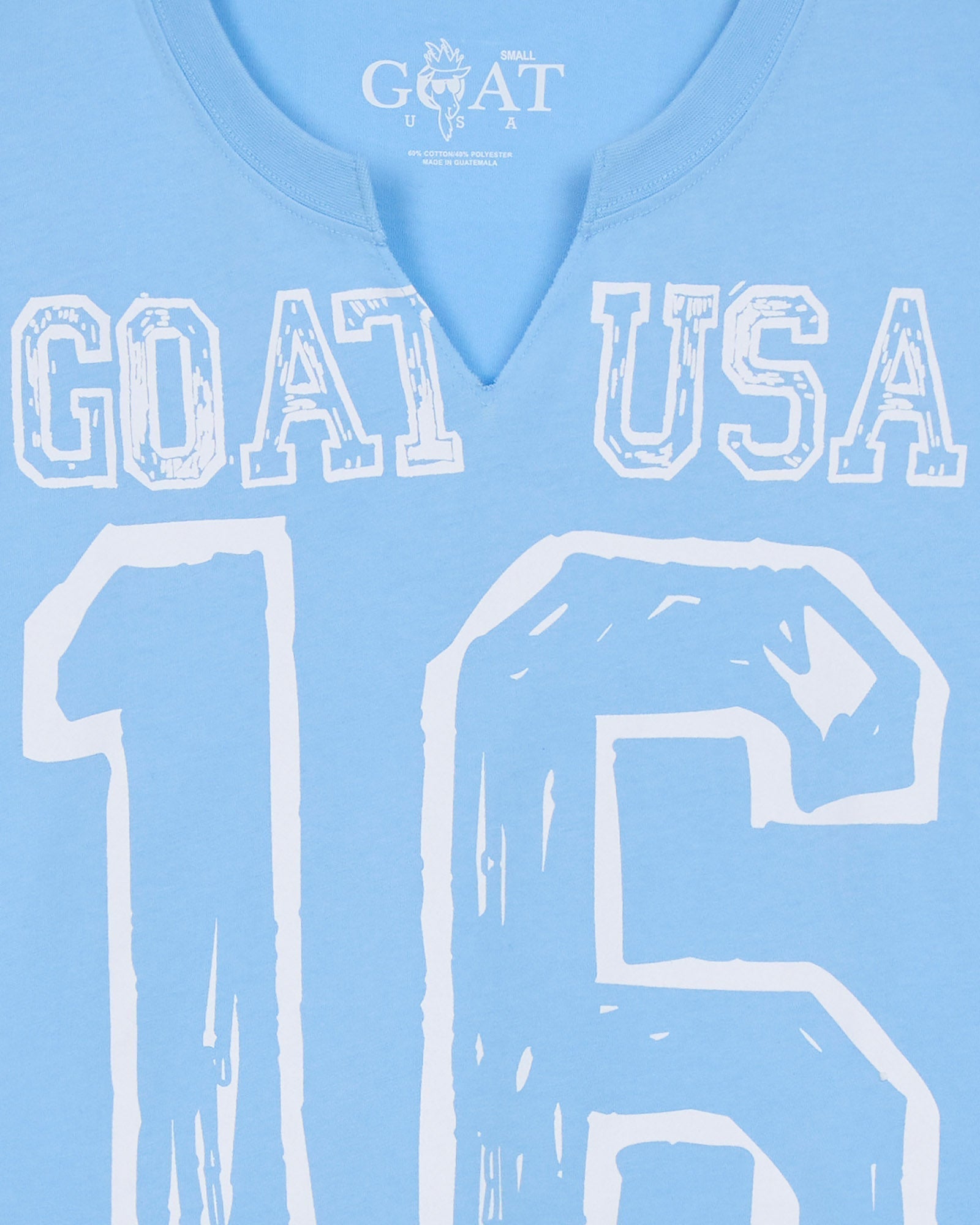 Light blue shirt with 'GOAT USA 16' printed in white