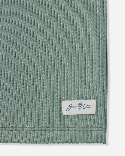 Close-up of patch on steeped sage pajama tank#color_steeped-sage