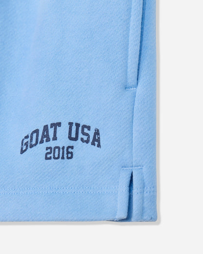 Close-up of carolina blue sweat shorts with 'GOAT USA 2016' text#color_carolina-blue
