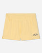 Front of corn milk sweat shorts#color_corn-milk