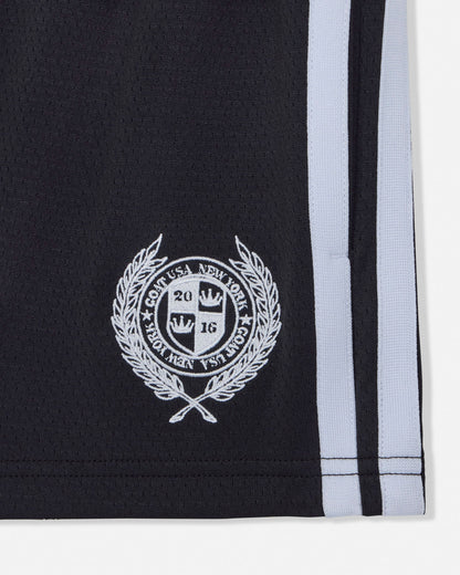 Black shorts with white emblem and stripe on a white background#color_black