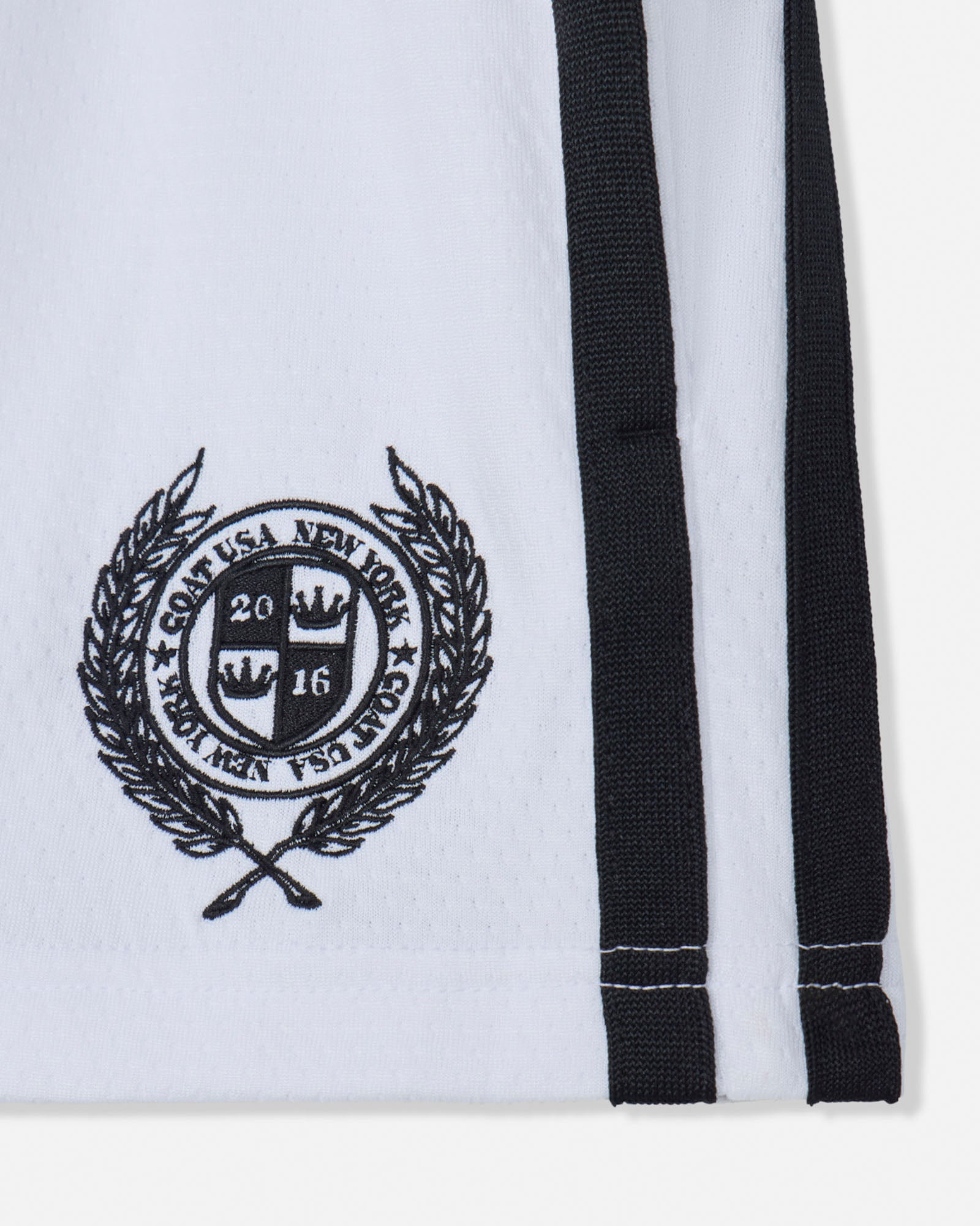 White sweatpants with black waistband and logo on a white background#color_white