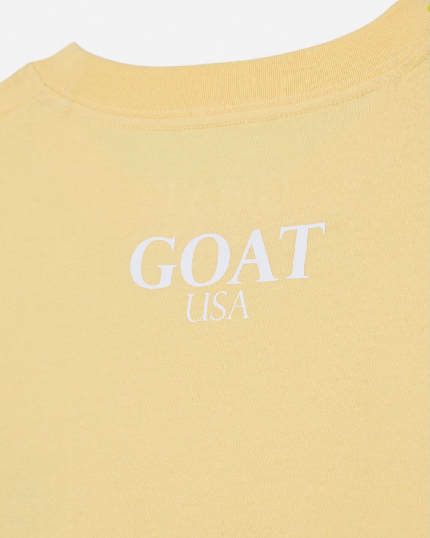 Back of yellow t-shirt#color_corn-milk
